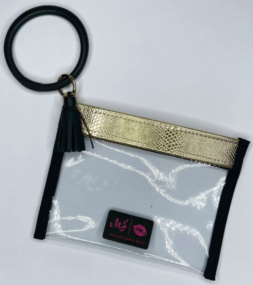 In the Clear Gold Serpent Wristlet from Makeup Junkie